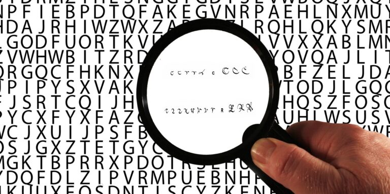 Alphabet letters with a magnifying glass looking at letters