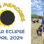 Nancy Dru with her eclipse glasses on looking at the Eclipse