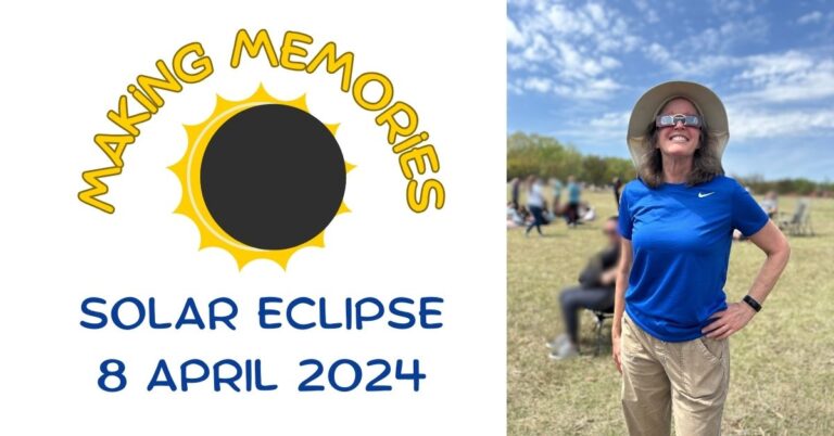 Nancy Dru with her eclipse glasses on looking at the Eclipse