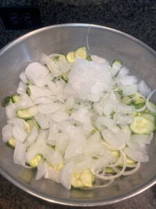 Icing mixture of cucumbers, onions, garlic that is mixed with salt