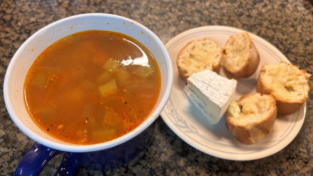 Chicken Vegetable soup with bread and cheese