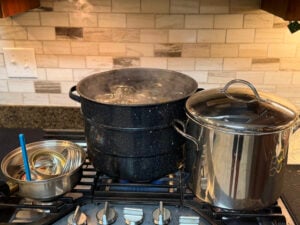 Boiling water bath, stock pot for brind and a pot for lids and rings.