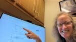 Nancy Dru at the FamilySearch Center pointing to Whatton, Nottinghamshire, UK